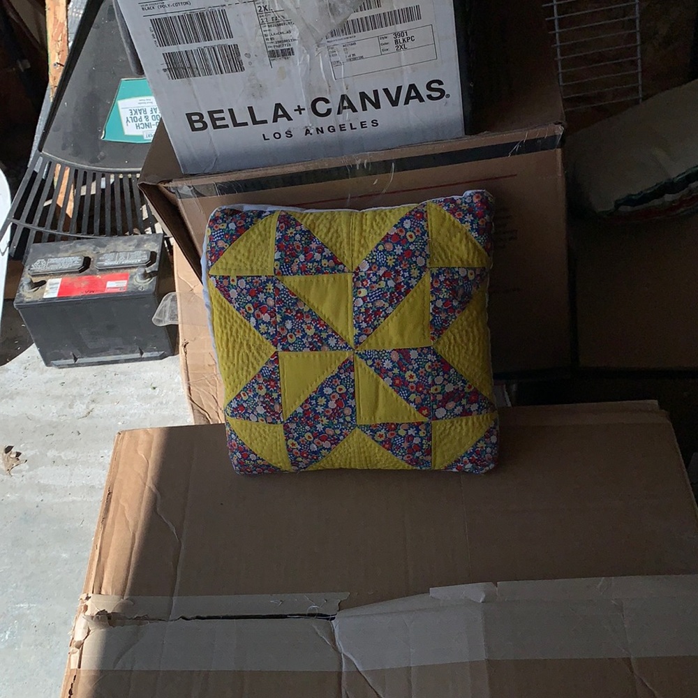 Yellow patch work pillow